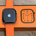Apple Watch Série 9 Hermès 41mm (GPS + Cellular) bracelet silicone Orange Hermès – photo 3 sur 5